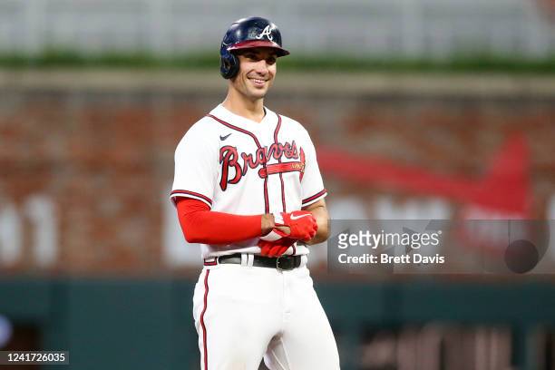 Matt Olson of the Atlanta Braves shows emotion after a RBI double against the St. Louis Cardinals in the fourth inning at Truist Park on July 5, 2022...