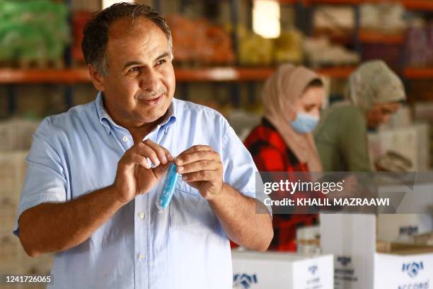 Salah Oqbi, founder and Owner of Jordan Chalk, speaks during an interview at the factory in Karak, around 120 kilometres south of the capital Amman...