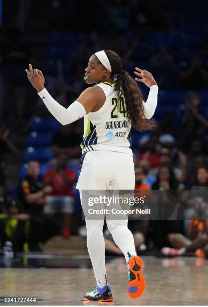 Arike Ogunbowale of the Dallas Wings celebrates a 3 point basket during the game against the Connecticut Sun on July 5, 2022 at the College Park...