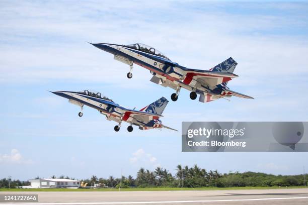 Taiwan Air Force Brave Eagle advanced jet trainers take off during a demonstration at Chihhang Air Base in Taitung County, Taiwan, on Wednesday, July...