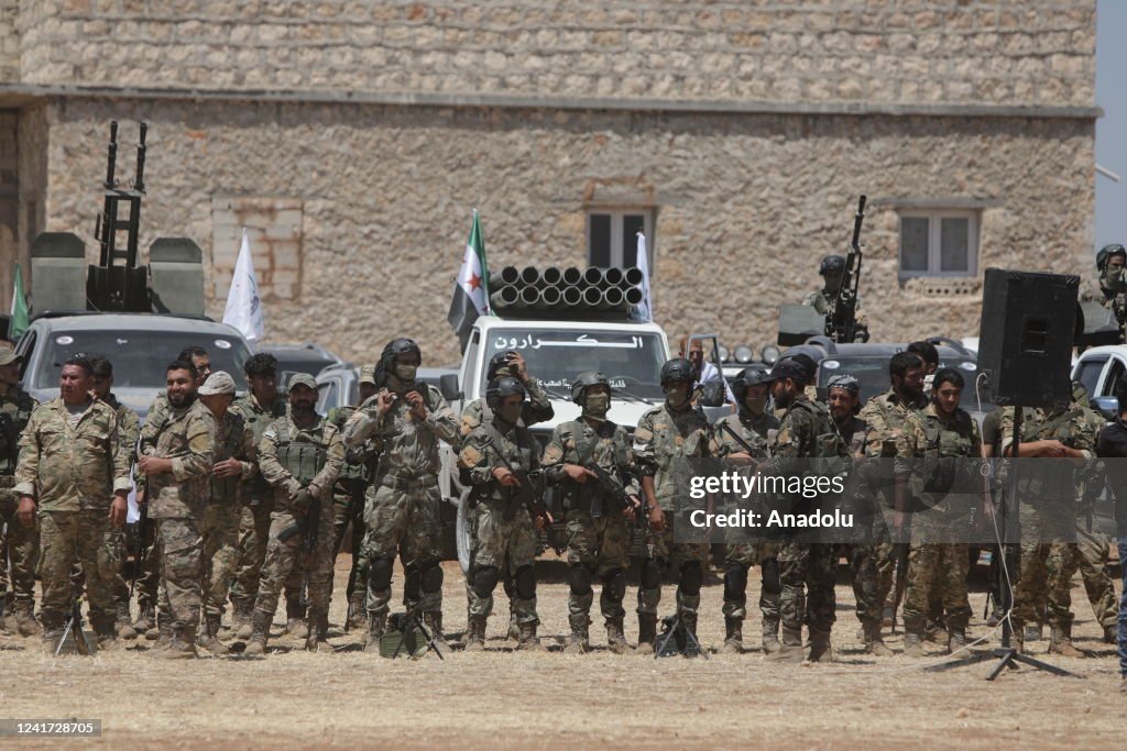 Syrian Machine Syrian National Army members prepare the vehicles and heavy machine ...
