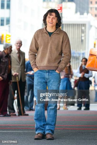Tom Holland is seen at the movie set of 'The Crowded Room' outside The Radio City Music Hall on July 05, 2022 in New York City.