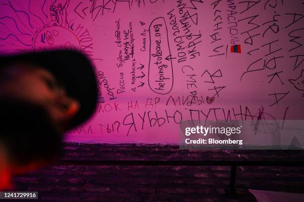 Graffiti reading "I'll kill Putin" on the ceiling of the Ploho bar in Tbilisi, Georgia, on Saturday, July 2, 2022. More than 20,000 Russian tech...