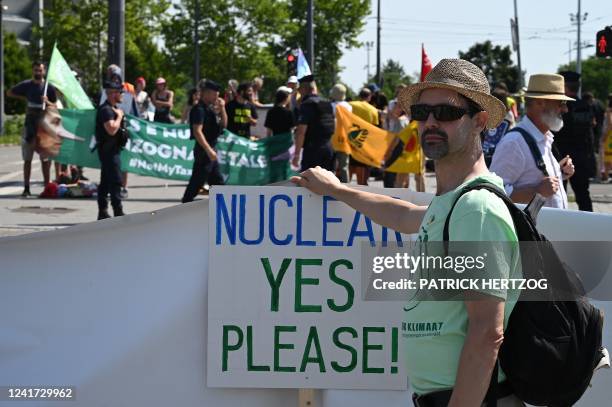 Pro-nuclear and anti-nuclear protesters take part in demonstrations ahead of a vote at the European Parliament on a motion to block the European...