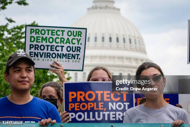 Environmental activists rally near the U.S. Capitol on July 6, 2022 in Washington, DC. The group Climate Action Campaign organized the rally to...