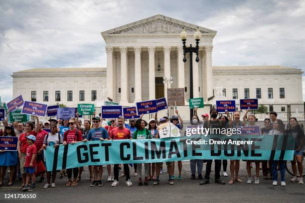 Environmental activists rally in front of the U.S. Supreme Court on July 6, 2022 in Washington, DC. The group Climate Action Campaign organized the...