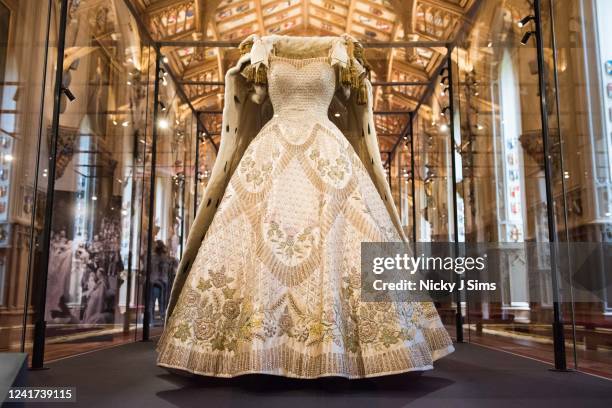 Continuing the Platinum Jubilee celebrations in this historic year, her Majesty's Coronation dress, designed by Sir Norman Hartnell and embroidered...