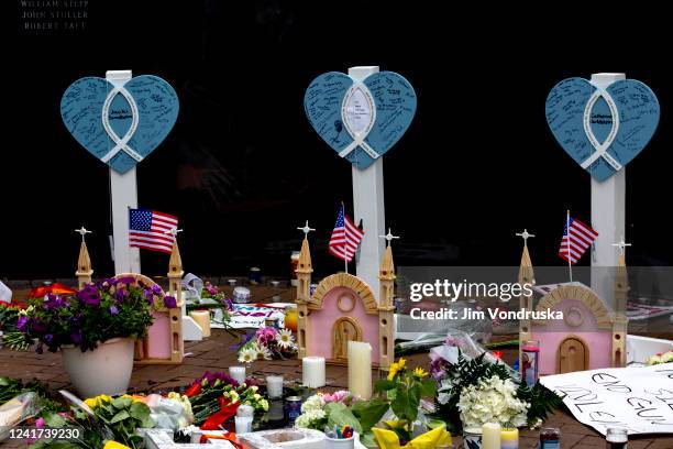 Memorial for the victims of a mass shooting at a Fourth of July parade is seen on July 6, 2022 in Highland Park, Illinois. Authorities have charged...