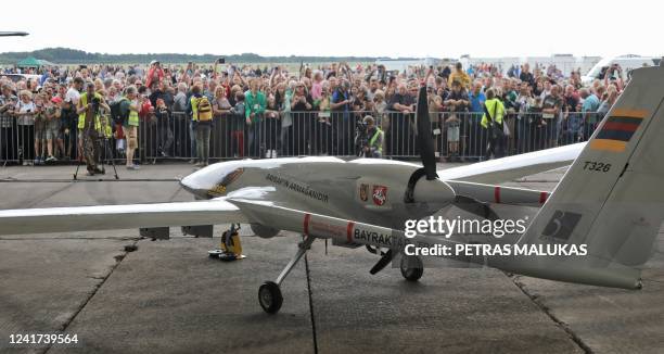 Turkish Bayraktar TB2 combat drone is on view during a presentation at the Lithuanian Air Force Base in Siauliai, Lithuania, on July 6, 2022. -...