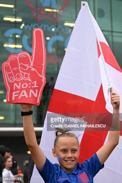 Young England fan poses for a photograph ahead of the UEFA Women's Euro 2022 Group A football match between England and Austria at Old Trafford in...