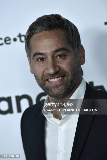 French state owned television group France Televisions' journalist Julien Benedetto poses prior to a press conference, on July 6, 2022 in Paris.