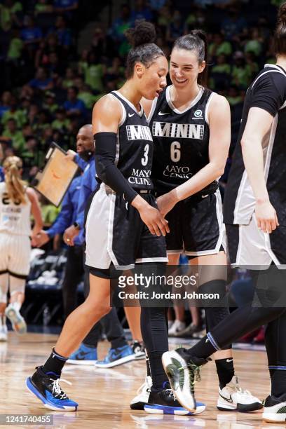 Aerial Powers and Bridget Carleton of the Minnesota Lynx embrace during the game against the Chicago Sky on July 6, 2022 at Target Center in...
