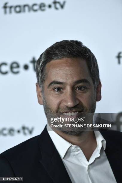 French state owned television group France Televisions' journalist Julien Benedetto poses prior to a press conference, on July 6, 2022 in Paris.