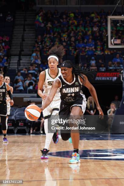 Sylvia Fowles of the Minnesota Lynx steals the ball during the game against the Chicago Sky on July 6, 2022 at Target Center in Minneapolis,...