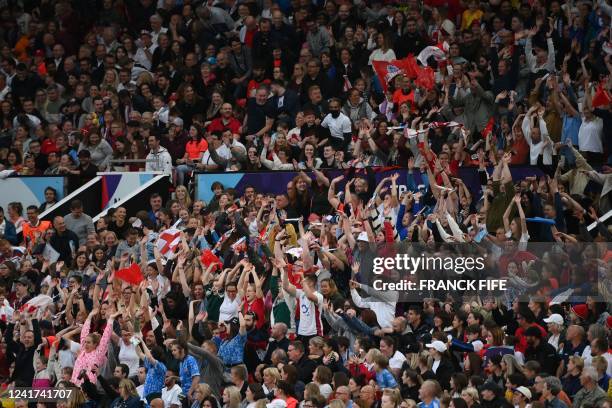 It's a Mexican Wave in the crowd during the UEFA Women's Euro 2022 Group A football match between England and Austria at Old Trafford in Manchester,...