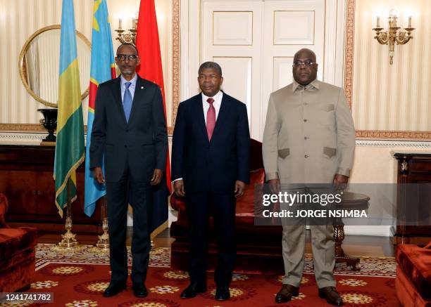 Rwanda President Paul Kagame , Angola President Joao Lourenco and Democratic Republic of Congo President Felix Tshisekedi pose for a photograph in...