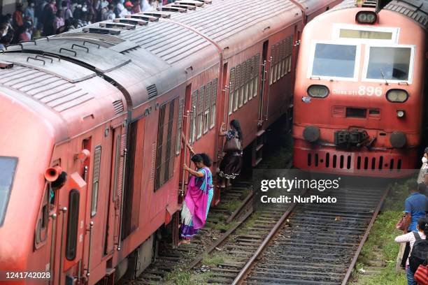 Passengers try to get into an overcrowded train at Colombo, Sri Lanka. On 6 July 2022. Other public transport in Sri Lanka has been disrupted due to...