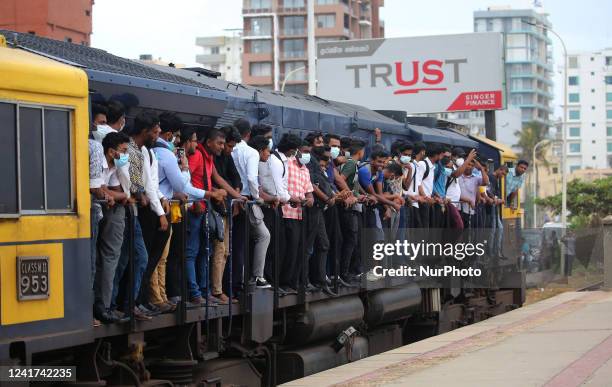 Passengers stand on board in the engine compartment of an overcrowded train in Colombo, Sri Lanka. On July 6, 2022. Other public transport in Sri...