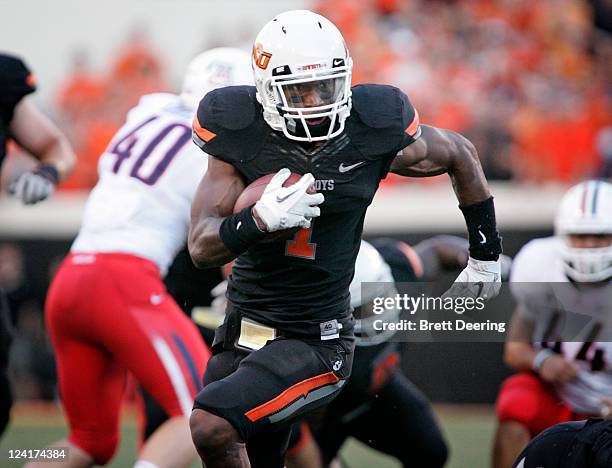 Running back Joseph Randle of the Oklahoma State Cowboys rushes up field during the tfirst half against the Arizona Wildcats on September 8, 2011 at...