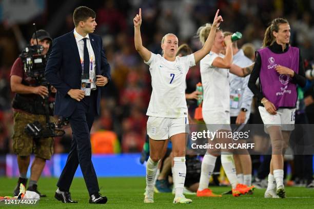 England's striker Beth Mead celebrates on the pitch after the UEFA Women's Euro 2022 Group A football match between England and Austria at Old...