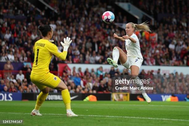 Beth Mead of England scores the opening goal during the UEFA Women's Euro England 2022 group A match between England and Austria at Old Trafford on...