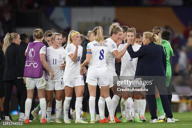 England players and Anna Signeul head coach of England celebrate victory after the UEFA Women's Euro England 2022 Group A match between England and...