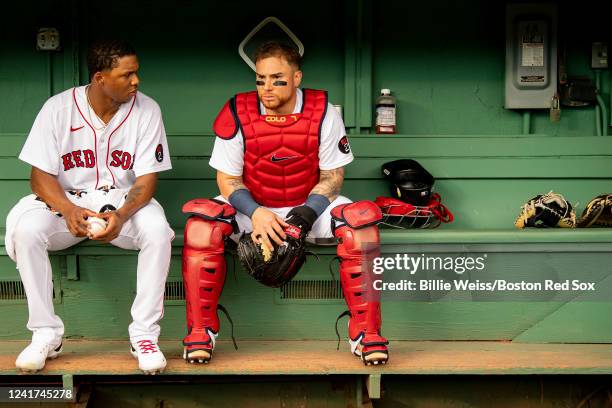 Brayan Bello of the Boston Red Sox talks with Christian Vazquez in the bullpen before a game against the Tampa Bay Rays on July 6, 2022 at Fenway...