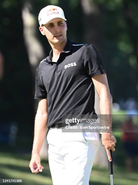 Golfer Cam Davis reacts after putting on the green during the final round of the John Deere Classic Golf Tournament on July 03 at TPC Deere Run,...