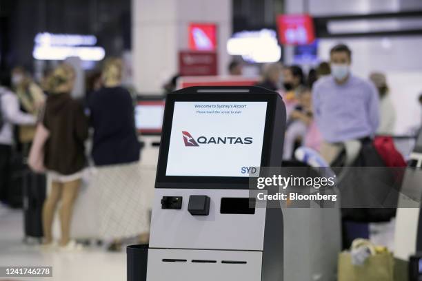 Qantas Airways Ltd. Automated check-in kiosk at Sydney Airport in Sydney, Australia, on Wednesday, July 6, 2022. Qantas, which carries the slogan...