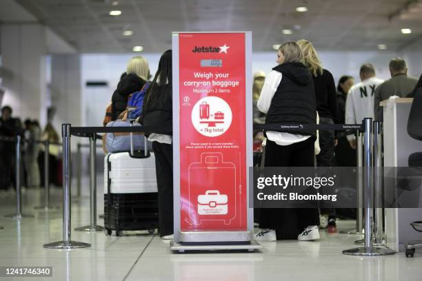 Baggage scale for Qantas Airways Ltd.'s low-cost unit Jetstar Airways at Sydney Airport in Sydney, Australia, on Wednesday, July 6, 2022. Qantas,...