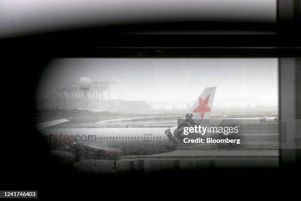 An aircraft operated by Qantas Airways Ltd.'s low-cost unit Jetstar Airways on the tarmac at Sydney Airport in Sydney, Australia, on Wednesday, July...