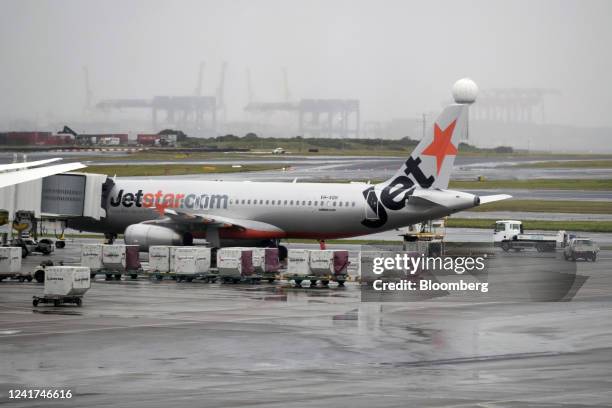 An aircraft operated by Qantas Airways Ltd.'s low-cost unit Jetstar Airways on the tarmac at Sydney Airport in Sydney, Australia, on Wednesday, July...