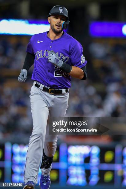 Colorado Rockies left fielder Kris Bryant rounds second base after hitting a home run against the Los Angeles Dodgers at Dodger Stadium on July 5,...