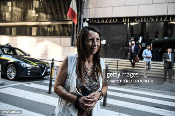 Egle Possetti, president of the committee representing the families of the 43 victims, talks to journalists outside the Genoa courthouse ahead of the...