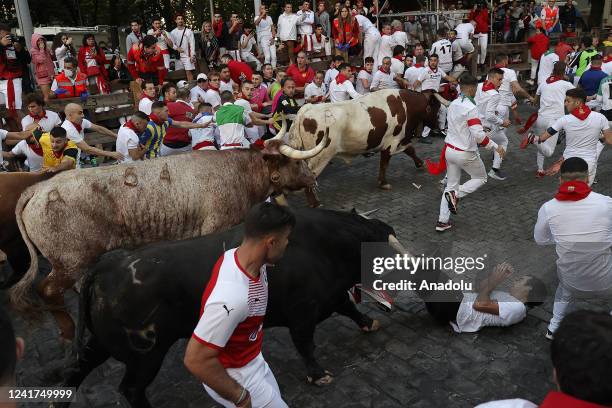 Hundreds of revelers from different nationalities fill the streets for the San Fermin Festival in Pamplona, Spain on July 07, 2022. People wearing...