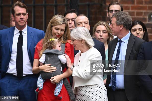 Secretary of State for Digital, Culture, Media and Sport, Nadine Dorries speaks to Carrie Johnson and her daughter Romy outside 10 Downing Street on...