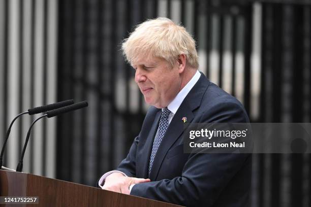 Prime Minister Boris Johnson addresses the nation as he announces his resignation outside 10 Downing Street on July 7, 2022 in London, England. After...