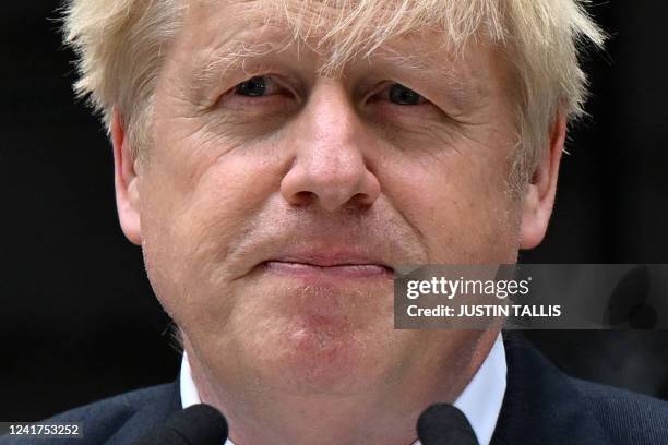 Britain's Prime Minister Boris Johnson makes a statement in front of 10 Downing Street in central London on July 7, 2022. Johnson quit as...