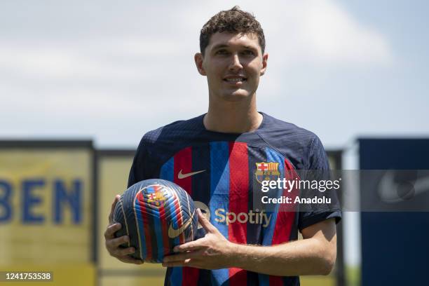 Barcelona defender Andreas Christensen poses for the media as he is presented as a FC Barcelona player at Ciutat Esportiva Joan Gamper on July 07,...