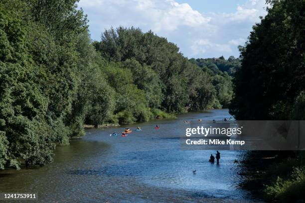 Canoeing and fishing on the River Severn on 25th June 2022 in Bridgenorth, United Kingdom. Bridgnorth is a town in Shropshire, England. The River...