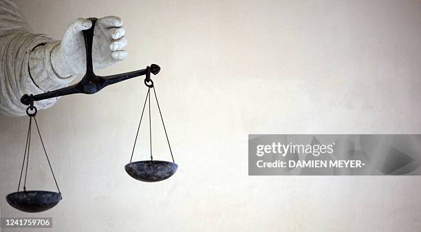 Picture taken on February 8, 2011 in Rennes, western France, shows part of a marble statue representing Themis, the Goddess of Justice at Brittany...