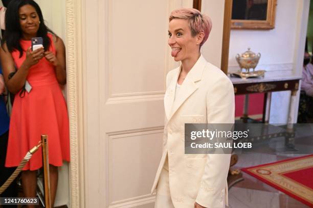 Soccer player Megan Rapinoe arrives for a Presidential Medal of Freedom ceremony honoring 17 recipients, including Rapinoe, in the East Room of the...