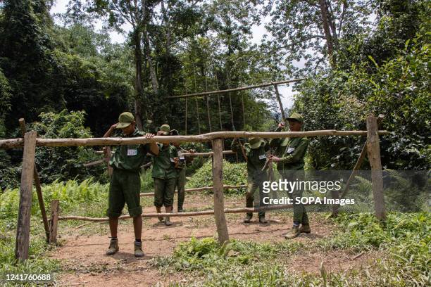 Members of the Mandalay People's Defence forces take part in training at their camp. The People's Defence force is the armed wing of Myanmar's...