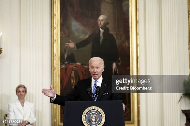 President Joe Biden speaks before presenting the Presidential Medal of Freedom during a ceremony in the East Room of the White House in Washington,...