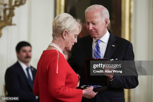 Cindy McCain accepts the President Medal of Freedom on the behalf of her late husband Sen. John McCain from U.S. President Joe Biden during a...