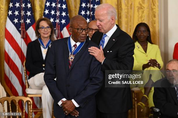 President Joe Biden presents attorney Fred Gray with the Presidential Medal of Freedom, the nation's highest civilian honor, during a ceremony...