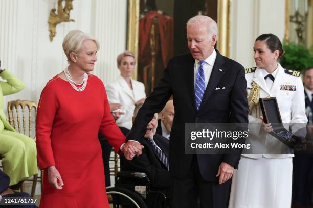 Cindy McCain accepts the President Medal of Freedom on the behalf of her late husband Sen. John McCain from U.S. President Joe Biden during a...