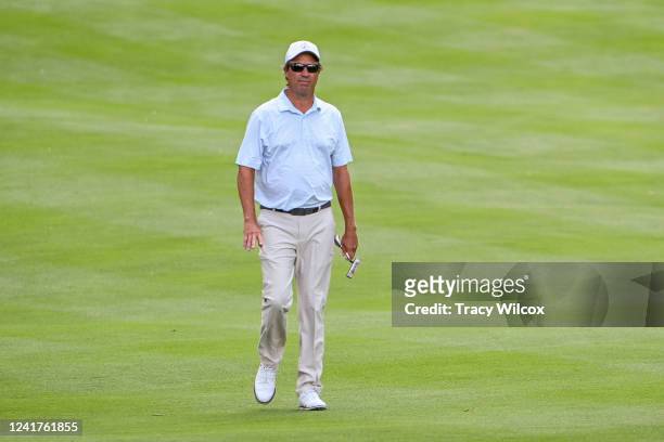 Stephen Ames of Canada waves at the 18th hole during the first round of the PGA TOUR Champions Bridgestone SENIOR PLAYERS Championship at Firestone...