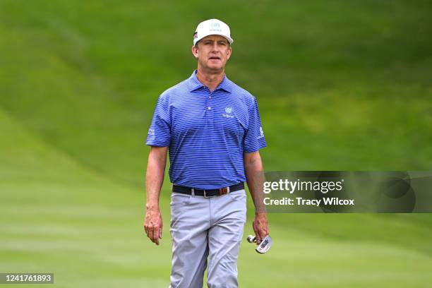 David Toms walks up the 18th hole during the first round of the PGA TOUR Champions Bridgestone SENIOR PLAYERS Championship at Firestone Country Club...