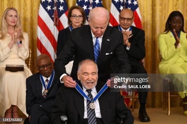 President Joe Biden presents Raul Yzaguirre with the Presidential Medal of Freedom, the nation's highest civilian honor, during a ceremony honoring...